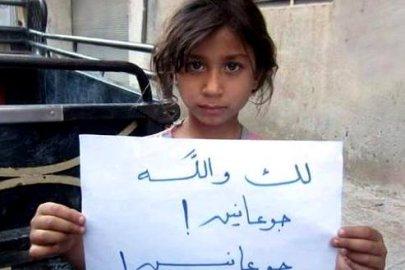 التايمز: سلاح التجويع أجبر السوريين على أكل لحم الكلاب