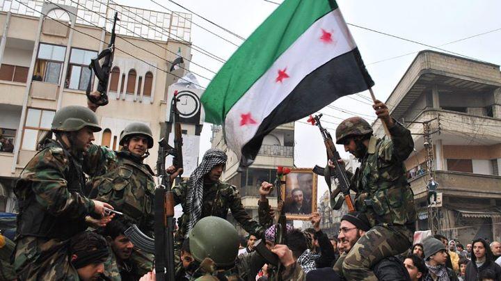 الجربا يطالب بزيادة تسليح الجيش الحر في سوريا