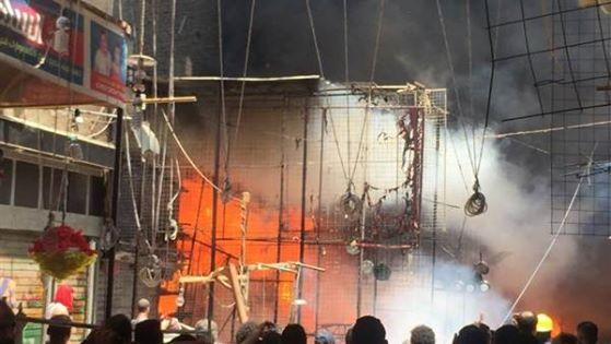 “ماس كهربائي” وراء حريق سوق إمبابة.. والحماية المدنية تحاول إطفاءه