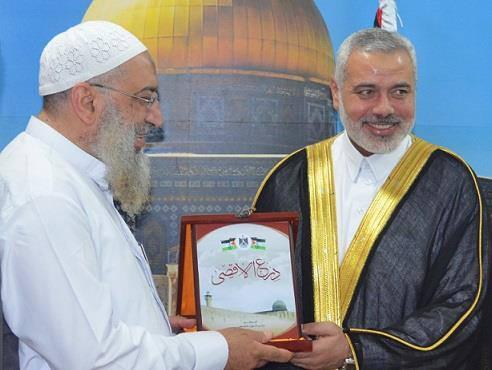 هنية يهدي برهامي درع الاقصى وسط استقبال حافل