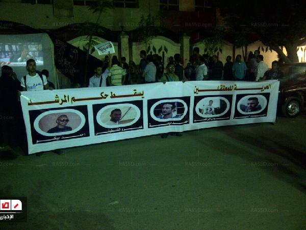 أهالي حلوان يرشقون «تمرد» بزجاجات المياه من الأسطح