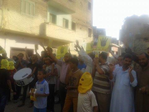 مسيرة في مدينة”قوص”بـ”قنا” تنديداً بالانقلاب العسكري