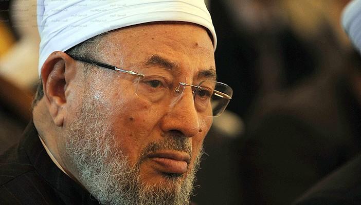 القرضاوي يدعو حكومة ماليزيا للإفراج عن أنور إبراهيم