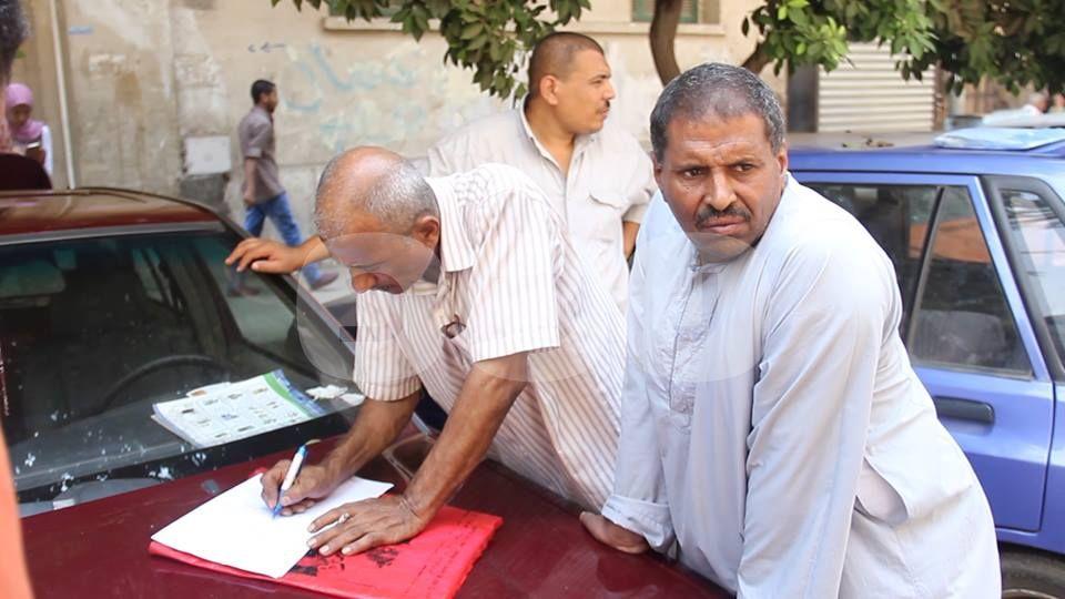 وقفة لعمال شركة أسيك أمام “الوزراء” رفضًا لفصلهم تعسفيًا