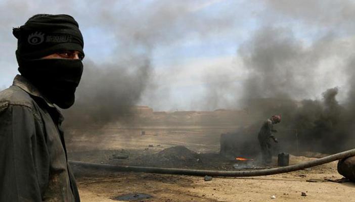 تنظيم الدولة يصلب 3 أشخاص وهم أحياء في سوريا