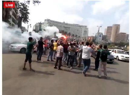 تظاهرة لطلاب جامعة القاهرة بـ”التحرير” رفضا لزيارة السيسى