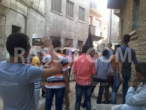 وقفة أمام منزل شهيد مدينة “قوص” في قنا