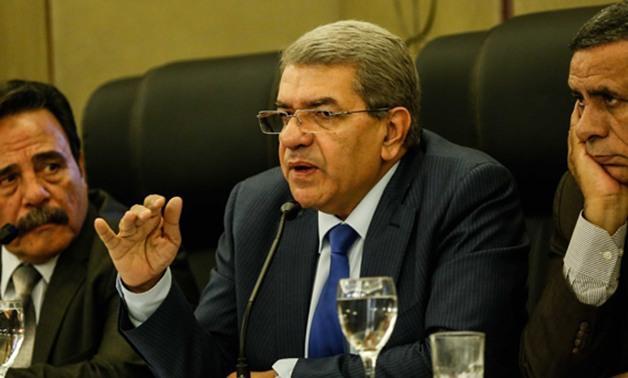 خبراء لـ”رصد”: قانون “الضريبة الموحدة” استنزاف جديد لأموال الشعب