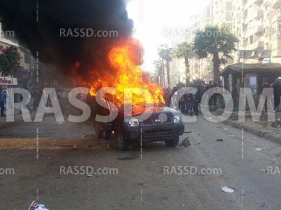 صور.. حرق “بوكس” بشارع فيصل من قبل المتظاهرين