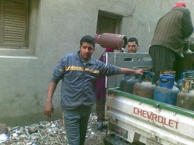 بالصور .. “معاً نبني مصر” توزع 350 أسطوانة غاز بقرية ميت خميس بالدقهلية