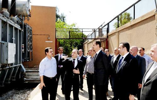 الاسد يظهر فى مشهد نادر فى إفتتاح محطة كهرباء بدمشق