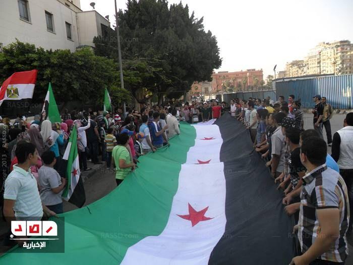 تظاهرة للجالية السورية أمام الجامعة العربية