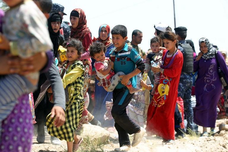 فرار 1700 أسرة عراقية من مدينة الفلوجة في أسبوعين