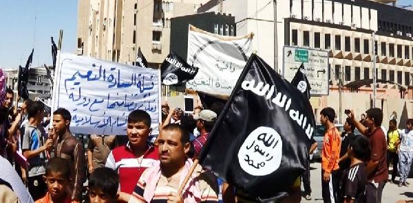 صور | “داعش” تكسب شعبية في العراق بتخفيض الأسعار وعدم فرض النقاب