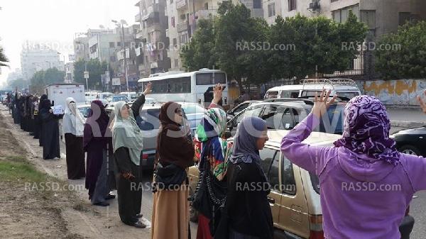 سلسلة بشرية مناهضة للانقلاب لحركة 7 الصبح بالهرم