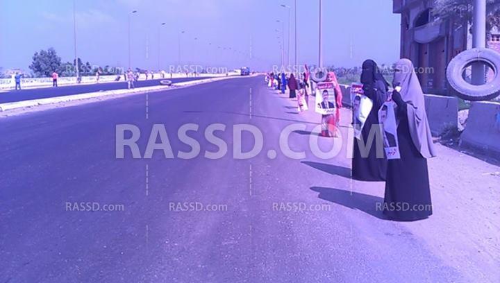 سلسلة بشرية بدمياط تنديدا بالعدوان على غزة