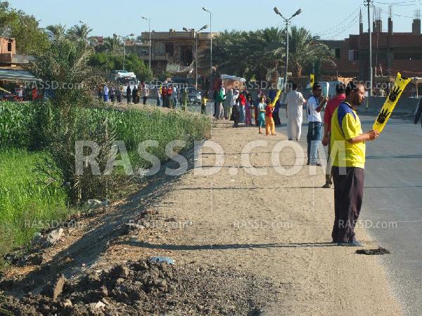 سلسلة بشرية لـ”نساء ضد الانقلاب” في “الأعلام” بالفيوم