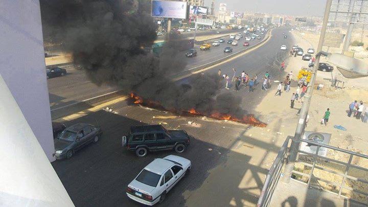 مجهولون يقطعون طريق الاوتستراد والدائري بالمعادي