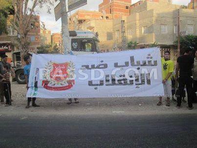 سلسلة بشرية لـ”شباب ضد الانقلاب” بدمياط