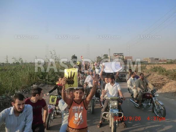 بالصور..مسيرة بالدراجات البخارية لرفض الانقلاب بالفيوم