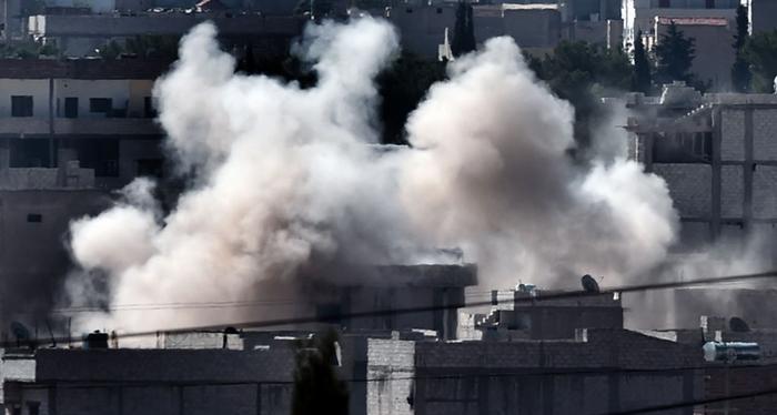 معارك على حدود كوباني وتفجيرات داخل المدينة