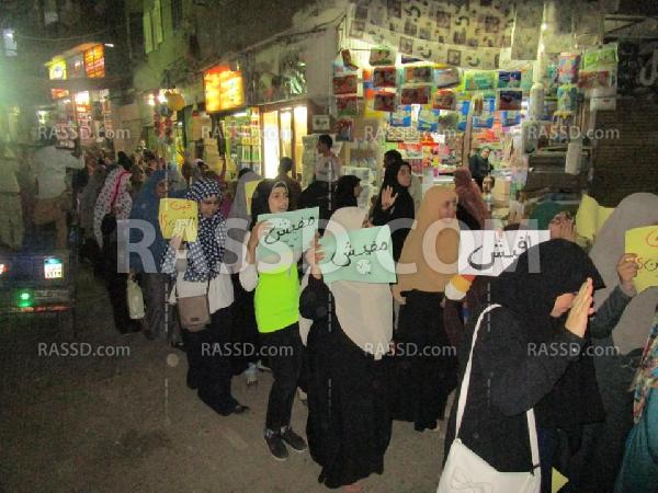 صور| مسيرة ليلية لـ”بنات ضد الانقلاب” في الفيوم