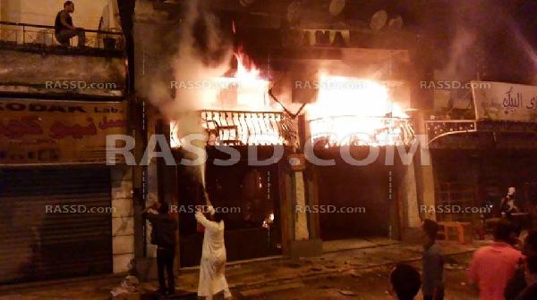 بالصور..نشوب حريق هائل بكافيتريا بالعريش