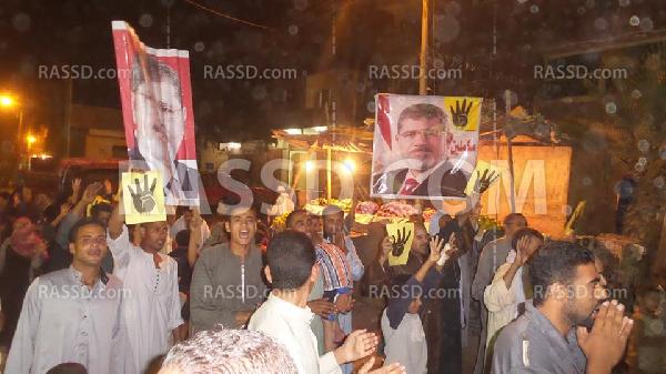 صور| تظاهرة بشمال الجيزة تطالب بعودة مرسي