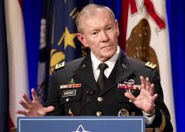 دمبسي في زيارة مفاجئة لبغداد وسط استمرار ضربات التحالف لداعش