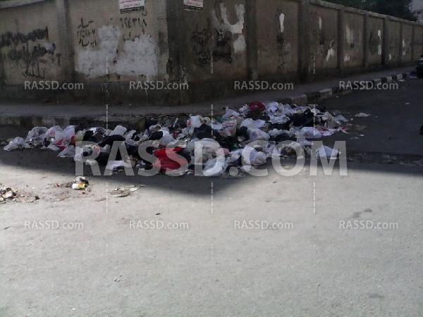 أزمة القمامة تحاصر مدراس حي الزهور في بورسعيد