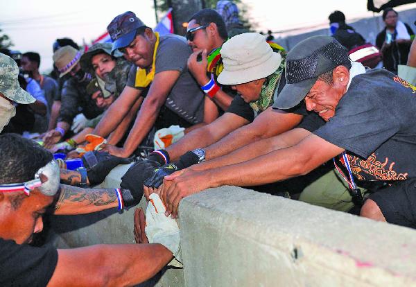 تايلاند..المعارضة تتعهد بمواصلة الاحتشاد لحين إجراء الانتخابات