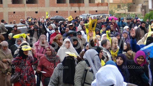 مسيرة ب 6 أكتوبر وسط الأمطار دعما للطلاب